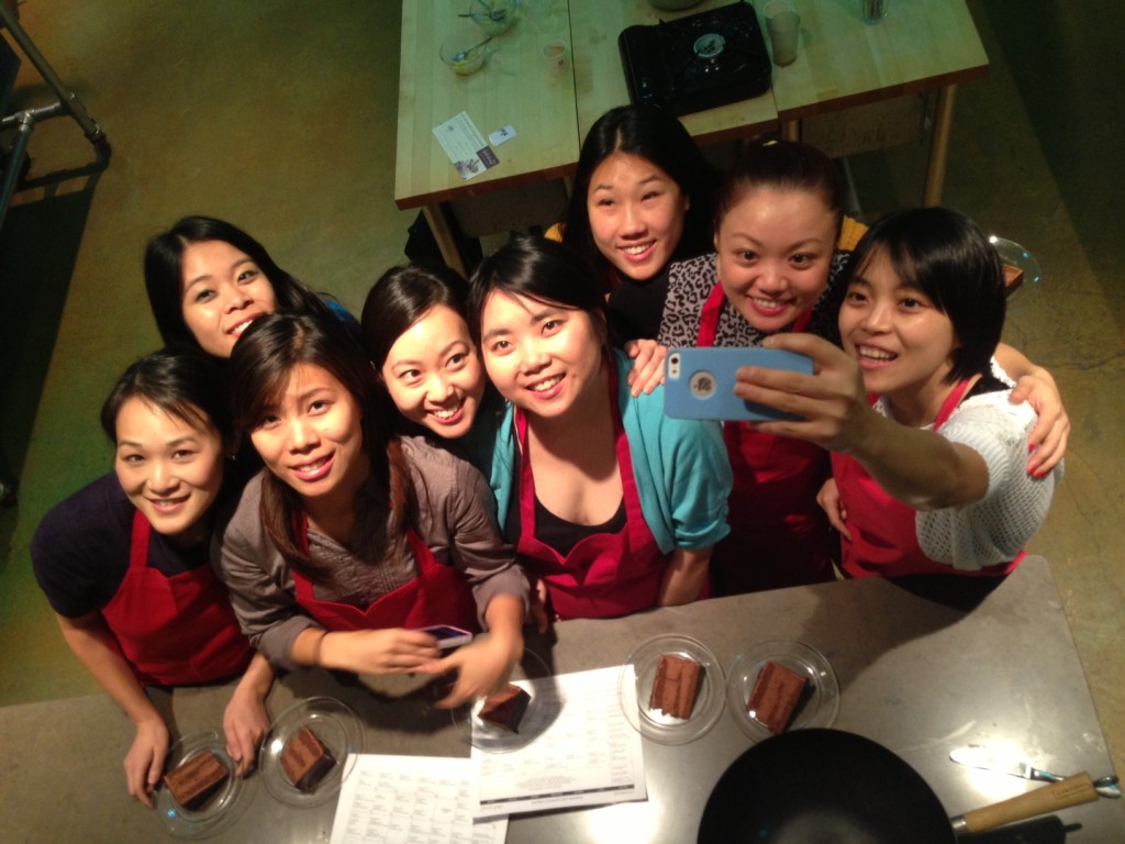 Taking a group picture in the cooking mirror! 